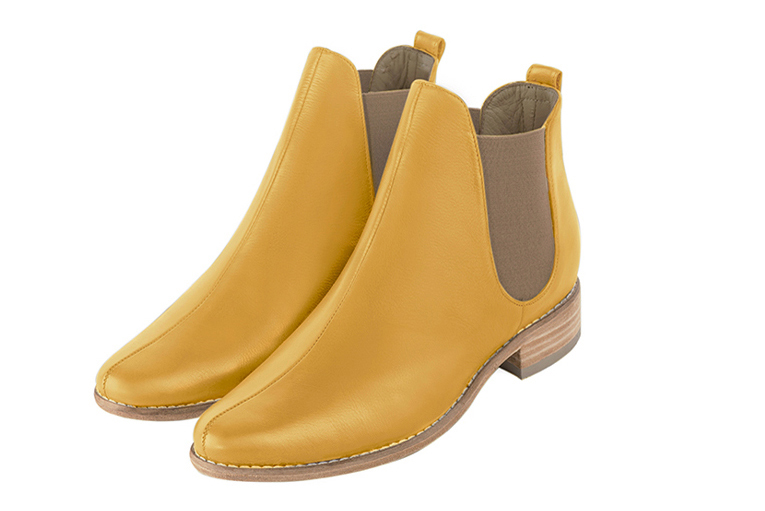 Mustard yellow and taupe brown women's ankle boots, with elastics. Round toe. Flat leather soles. Front view - Florence KOOIJMAN